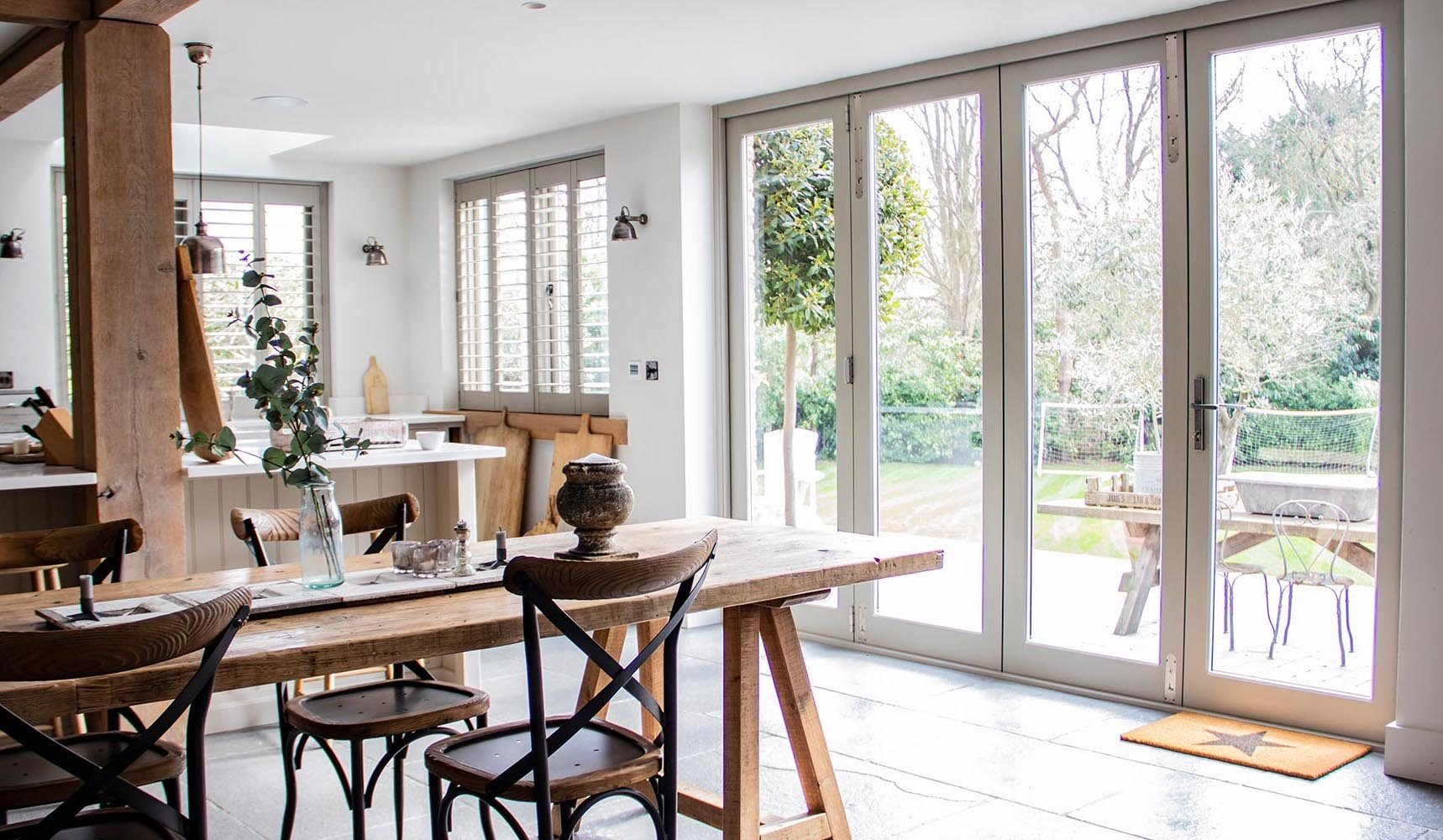 uPVC door handle by From the Anvil, shown on dining room garden doors.